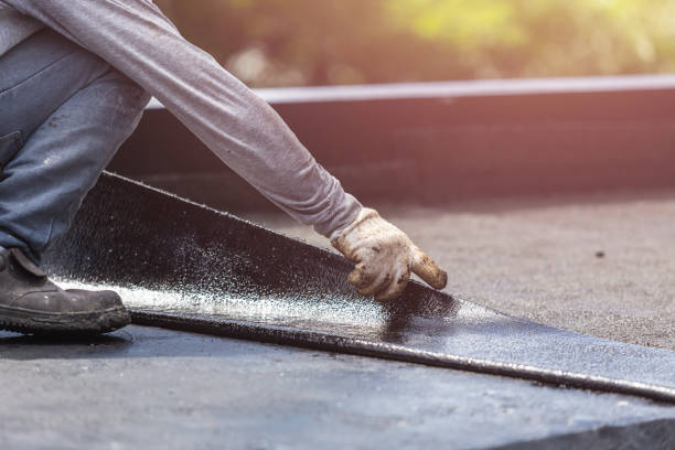 Professional Basement Waterproofing technician working in Fork, MD